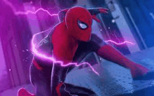 a close up of a person in a spiderman costume with lightning coming out of his chest .