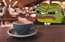 a green frog is sitting at a table with a cup of coffee on a saucer