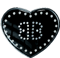 a black heart with diamonds on it and the letter w on it