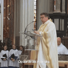 a priest stands at a podium in a church with the words op aarde als in de sky above him