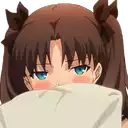 a girl with brown hair and blue eyes is hiding behind a pillow .