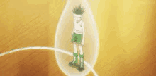 gon from hunter x hunter is standing in a bubble on a yellow background .