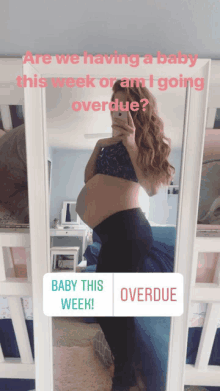 a pregnant woman is taking a selfie in front of a mirror with the question are we having a baby