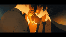 a man in a suit is lighting a cigarette for another man