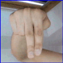 a close up of a person 's hand with their fingers visible