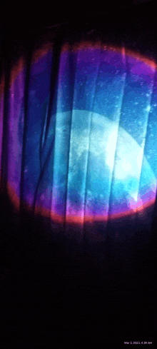 a blue and purple curtain with the date mar 3 2021 on the bottom