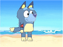 a cartoon dog is standing on a sandy beach near the ocean