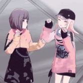 two anime girls are standing next to each other with one wearing a pink shirt that says ' nikki ' on it