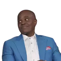a man wearing a blue suit and white shirt