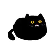a black cat with yellow eyes is laying down and looking at the camera .