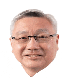 a close up of a man 's face wearing glasses and smiling .