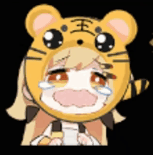 a girl is wearing a tiger mask and crying .