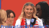 a woman wearing sunglasses and a scarf talks into a microphone with the words pressure what pressure