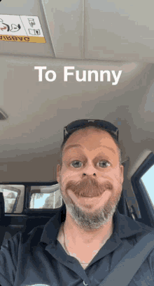 a man in a car with a funny face and the words to funny below him