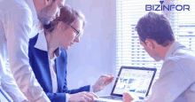 a group of people looking at a laptop screen with bizinfor written on the bottom