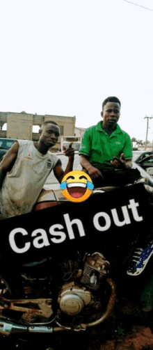 two men standing next to a car with the words cash out written on it