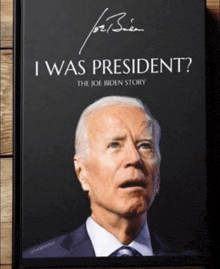 a book titled " i was president " shows a man in a suit and tie