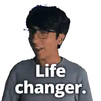 a man wearing glasses says life changer