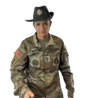 a woman in a u.s. army uniform is wearing a hat