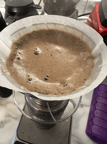 a close up of a coffee filter on a stove top