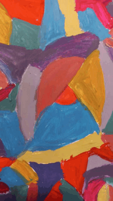 a close up of a colorful painting with red yellow blue and purple colors