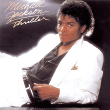 the cover of michael jackson 's thriller album features a man in a white suit