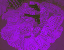 two guns are laying on top of a pile of money that is purple