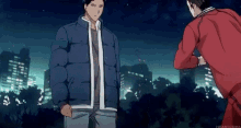 a couple of men standing next to each other in front of a city at night .