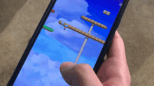 a person is playing a video game on their phone with a score of 27