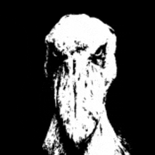 a black and white drawing of a turkey 's head with a skull on it .