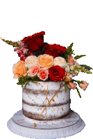 a naked cake with flowers on top of it on a white plate