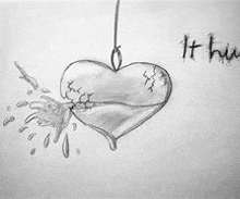 a black and white drawing of a broken heart hanging from a hook .