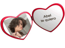 a heart shaped mirror says abel te quiero