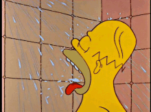 homer simpson is taking a shower with his tongue out