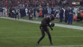 a football player is on the field with a fox nfl logo in the corner