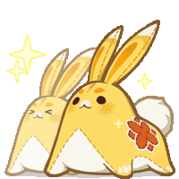 a couple of yellow rabbits with a flower on their backs