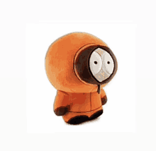 a stuffed kenny from south park is sitting on a white background