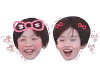 two faces of a boy with chinese characters around them