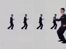 a man in a suit and tie is running in a row