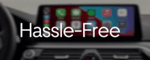 a blurred image of a car dashboard with the words hassle-free written on it