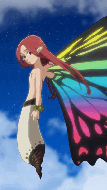 a girl with red hair and a rainbow colored butterfly wing