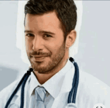 a man with a beard is wearing a white lab coat and a tie with a stethoscope around his neck .