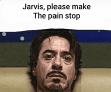 a picture of tony stark with the words jarvis please make the pain stop above him