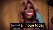 a woman with a fake smile on her face and the words i gained all hope today behind her