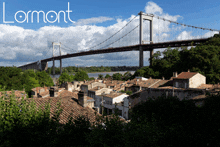 a bridge over a river with the word lormont on the bottom