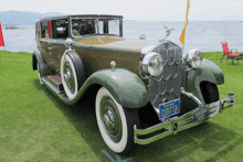 an old car with a california license plate that reads isotta