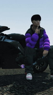 a person wearing a purple jacket is sitting on a motorcycle