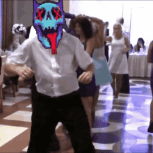 a man dancing with a pixelated face that says ' x ' on it