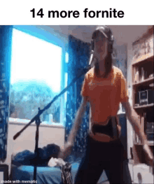 a woman is dancing in front of a microphone in a room with the words `` 14 more fornite '' written above her .