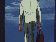 a man in a white suit is carrying a briefcase